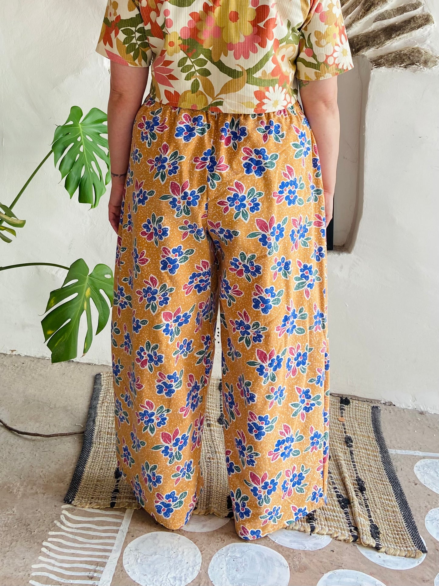DESERT FOX Orange Floral Print Wide Leg Trousers - M/L
