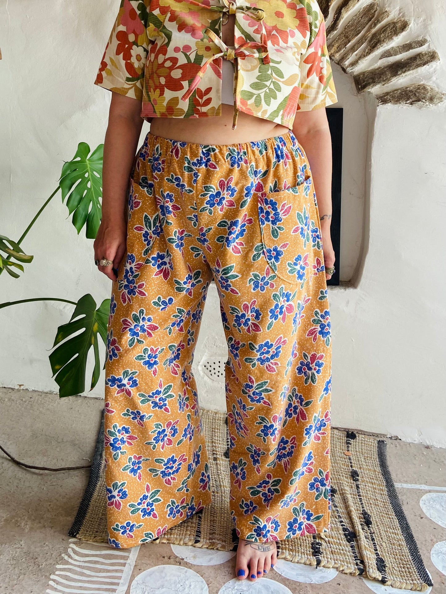 DESERT FOX Orange Floral Print Wide Leg Trousers - M/L