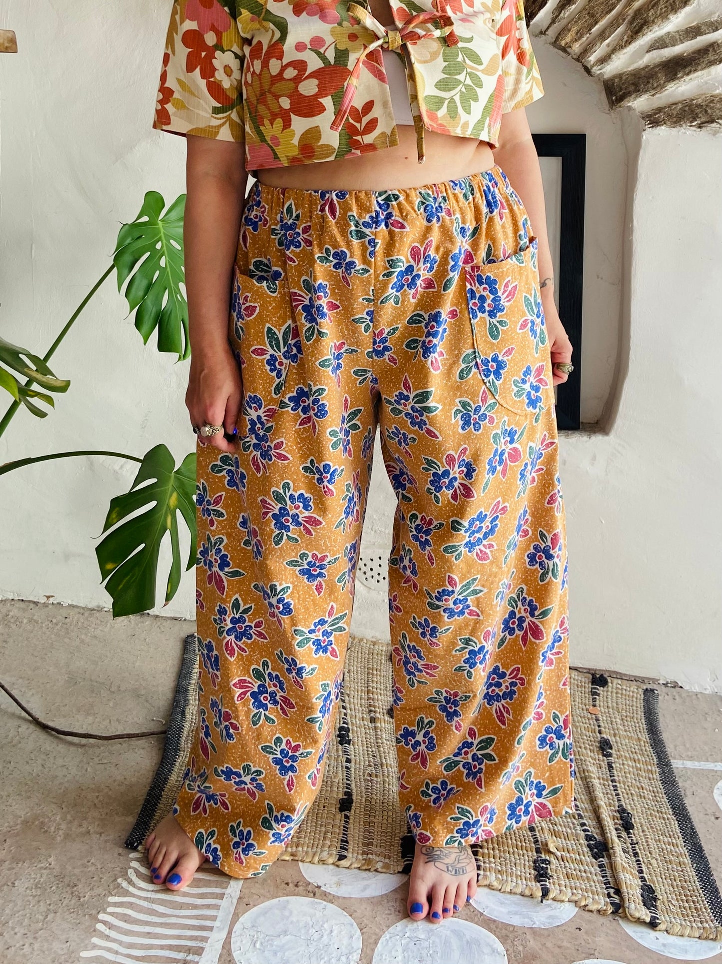 DESERT FOX Orange Floral Print Wide Leg Trousers - M/L