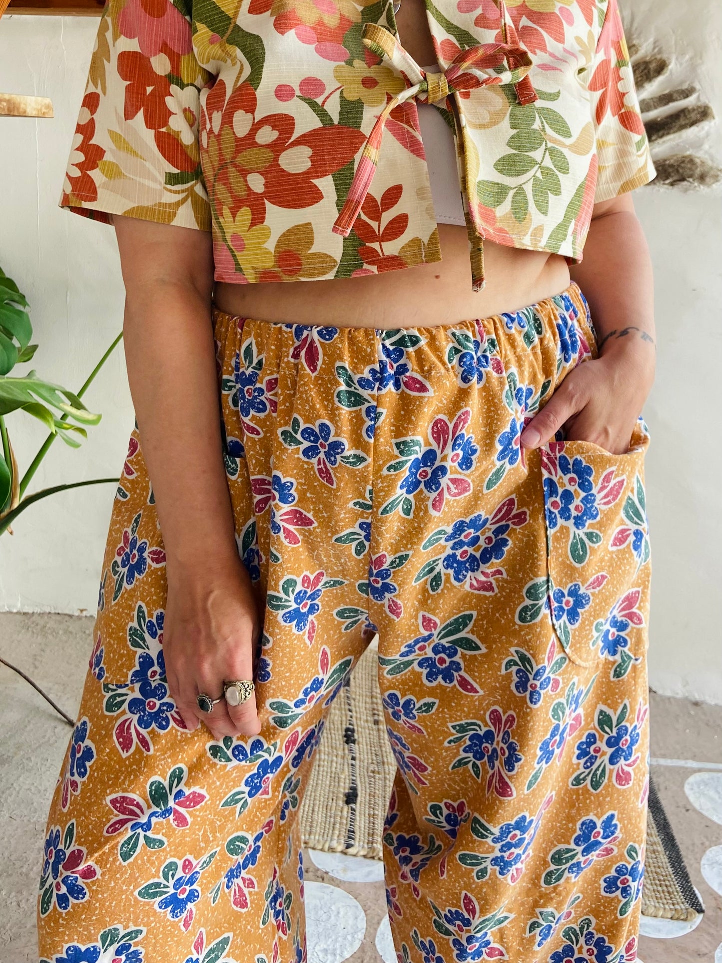 DESERT FOX Orange Floral Print Wide Leg Trousers - M/L
