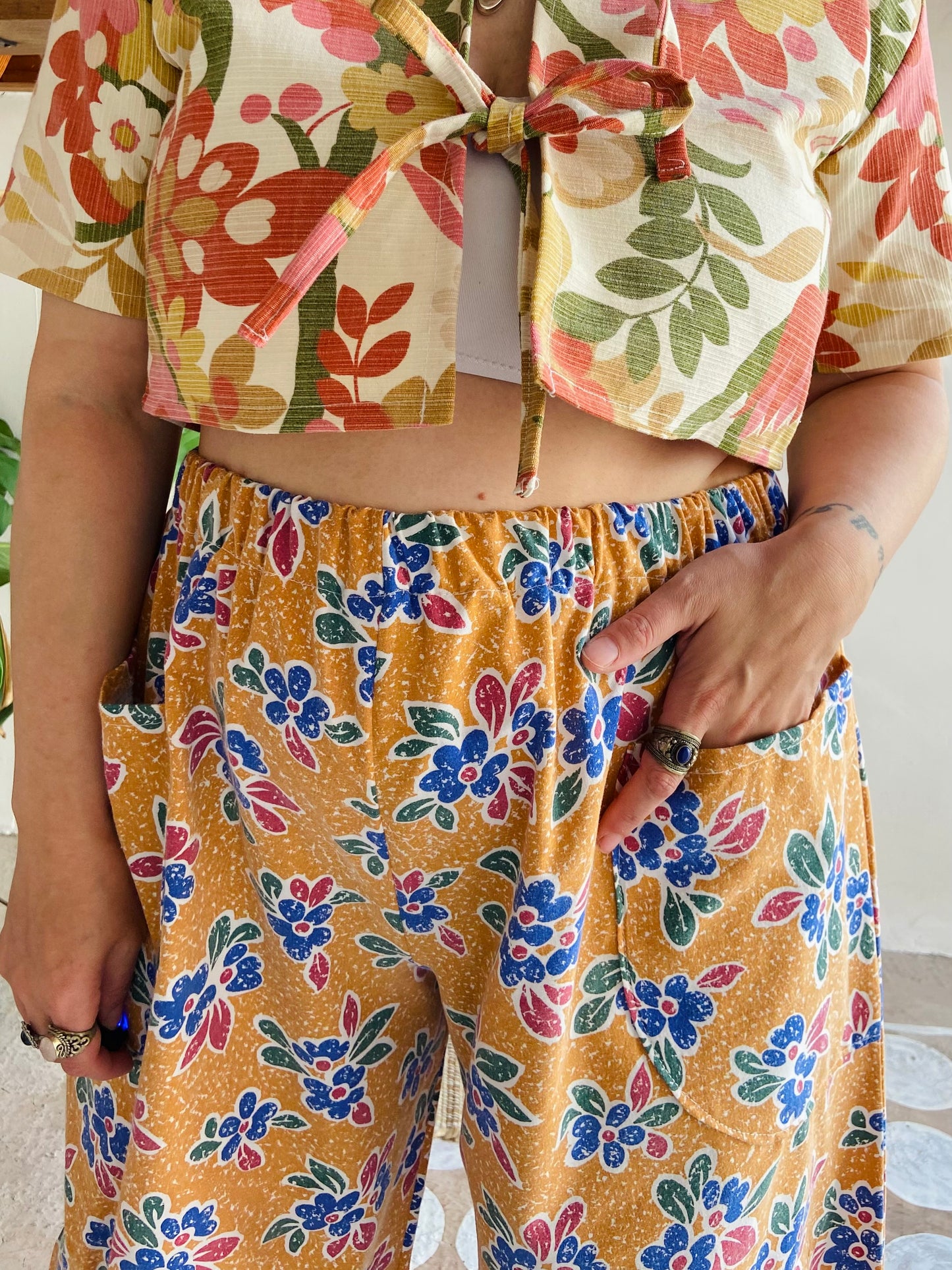 DESERT FOX Orange Floral Print Wide Leg Trousers - M/L